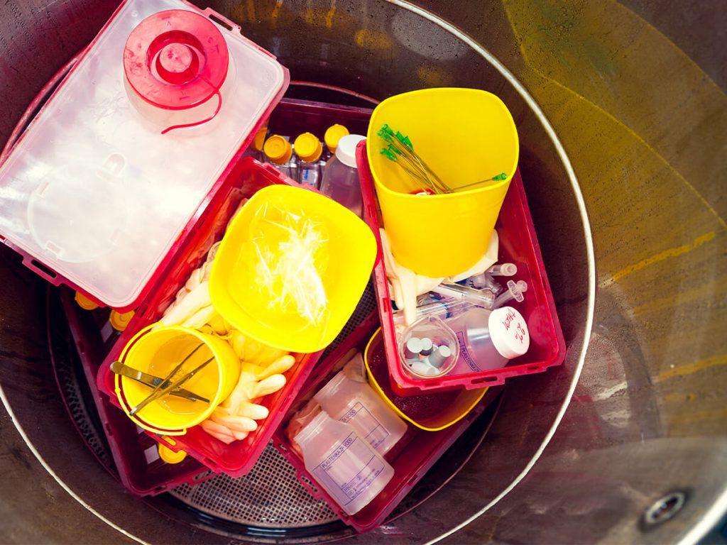 hazardous waste in a waste bin