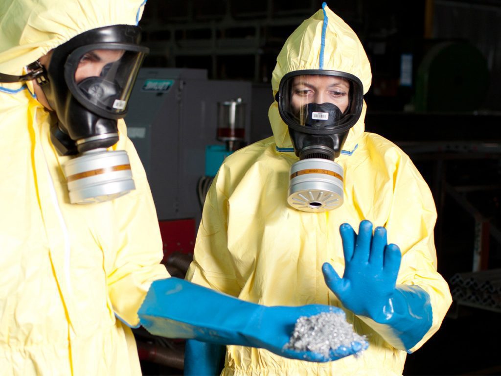 Biohazard expert in yellow protection sweet disposing infested material
